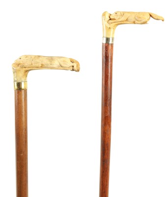Lot 498 - TWO 19TH CENTURY CARVED ANTLER HORN WALKING STICKS