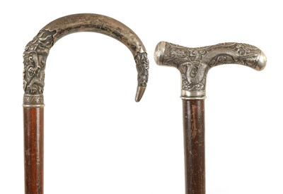 Lot 505 - TWO LATE 19TH CENTURY CHINESE SILVER MOUNTED WALKING STICKS