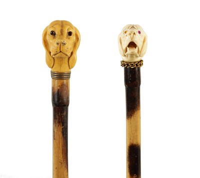 Lot 46 - TWO LATE 19TH CENTURY DOGS HEAD WALKING STICKS