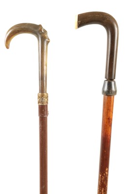 Lot 483 - TWO EARLY 20TH CENTURY HORN HANDLED SWORD STICKS
