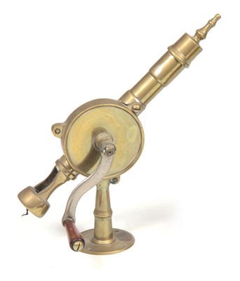 Lot 47 - A 19TH CENTURY CAST BRASS BAR CORKSCREW