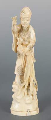 Lot 210 - A JAPANESE MEIJI PERIOD IVORY OKIMONO