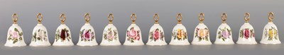 Lot 165 - A SET OF TWELVE PORCELAIN BELLS