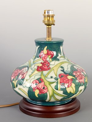 Lot 79 - A 1980S MOORCROFT GREEN FLORAL LAMP BASE
