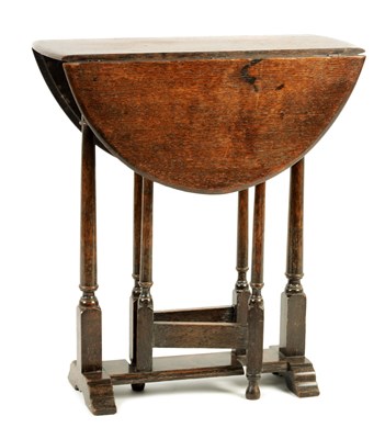 Lot 926 - A 19TH CENTURY SLEDGE-FOOT OAK DROP LEAF TABLE OF 17TH CENTURY DESIGN