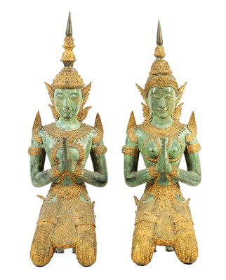 Lot 227 - A PAIR OF 20TH CENTURY KNEELING BRONZE PATINATED GREEN AND GILT TIBETAN BUDDHAS
