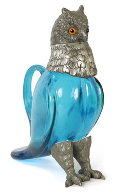 Lot 125 - A 19TH CENTURY BLUE GLASS CLARET JUG IN THE FORM OF AN OWL