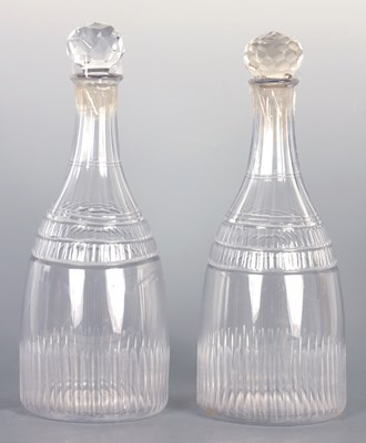 Lot 19 - A PAIR OF GEORGIAN MALLET SHAPED CUT GLASS DECANTERS