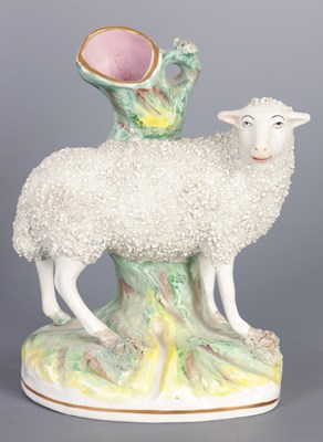 Lot 118 - A 19TH CENTURY STAFFORDSHIRE FIGURAL SPILL VASE