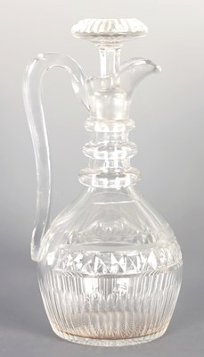 Lot 40 - A GEORGIAN CUT GLASS CLARET JUG