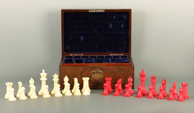 Lot 602 - A JACQUES & SONS STAUNTON PATTERN NEUTRAL AND RED STAINED IVORY CLUB SIZE CHESS SET