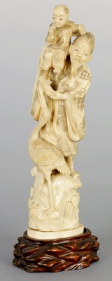 Lot 266 - A JAPANESE IVORY OKIMONO