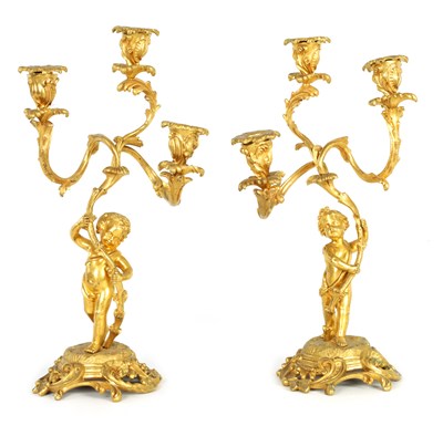 Lot 452 - A PAIR OF 19TH CENTURY ORMOLU FIGURAL THREE BRANCH CANDELABRA