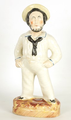 Lot 175 - A 19TH CENTURY STAFFORDSHIRE FIGURE OF A SAILOR