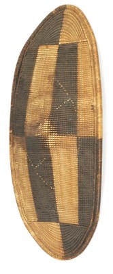 Lot 645 - A 19TH CENTURY AFRICAN WOVEN WICKER TRIBAL SHIELD