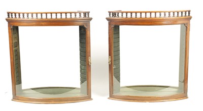 Lot 1482 - A PAIR OF 19TH CENTURY MAHOGANY BOW FRONTED DISPLAY CABINETS