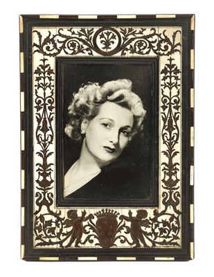Lot 505 - A 19TH CENTURY FLORENTINE IVORY AND EBONY PHOTOGRAPH FRAME