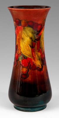 Lot 41 - A WILLIAM MOORCROFT SLENDER BALUSTER VASE tube...