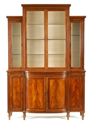 Lot 969 - A GEORGE III SHERATON STYLE FIDDLE-BACK MAHOGANY BREAKFRONT BOOKCASE OF SMALL SIZE AND PROPORTIONS