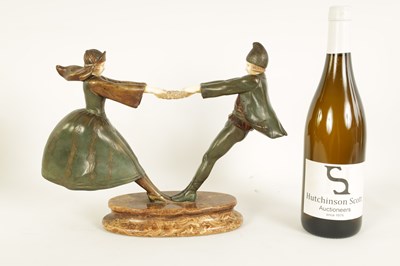Lot 493 - AN ART DECO FIGURAL BRONZE AND IVORY SCULPTURE