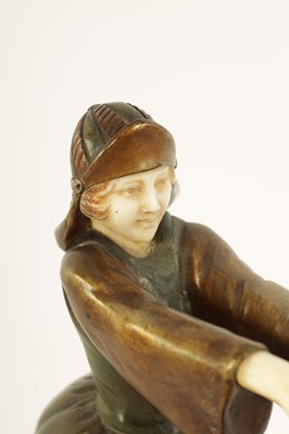 Lot 493 - AN ART DECO FIGURAL BRONZE AND IVORY SCULPTURE