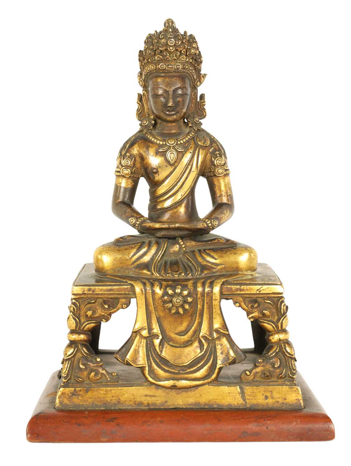 Lot 203 - AN EARLY GILT BRONZE TIBETAN BUDDHA DEPICTING AKSHOBHYA