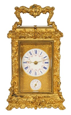 Lot 712 - A FINE MID 19TH CENTURY GILT BRASS FRENCH ROCOCO REPEATING CARRIAGE CLOCK WITH ALARM OF SMALL SIZE - THE CASE WITH MAKERS STAMP TO THE BASE PLATE  S.WEHL. ST. PETERSBURG
