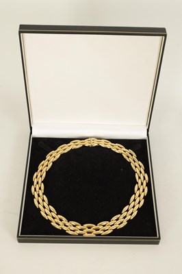 Lot 252 - CARTIER. A LADIES 18CT YELLOW GOLD GENTIANE CHOKER NECKLACE