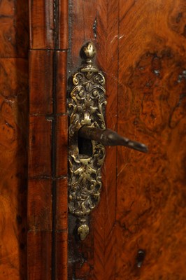 Lot 1113 - WINDMILLS, LONDON.  A GEORGE II BURR WALNUT QUARTER CHIMING LONGCASE CLOCK