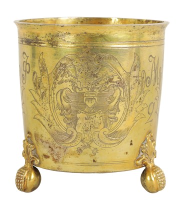 Lot 325 - A LATE 17TH CENTURY GERMAN SILVER GILT CYLINDRICAL BEAKER BEARING ENGRAVED FAMILY CRESTS AND INITIALS
