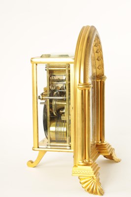 Lot 714 - ATTRIBUTED TO THOMAS COLE.  A FINE GILT BRASS GOTHIC REVIVAL TWIN FUSEE GILT BRASS STRUT CLOCK OF LARGE PROPORTIONS CIRCA 1860