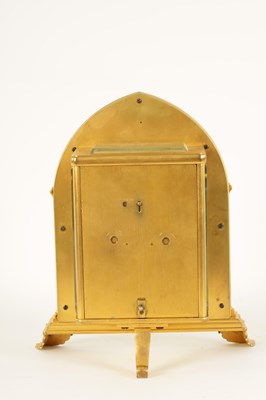 Lot 714 - ATTRIBUTED TO THOMAS COLE.  A FINE GILT BRASS GOTHIC REVIVAL TWIN FUSEE GILT BRASS STRUT CLOCK OF LARGE PROPORTIONS CIRCA 1860