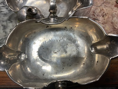 Lot 329 - AN IMPORTANT AND RARE PAIR OF GEORGE I CAST SILVER DOUBLE LIPPED SAUCE BOATS BY PIERRE PLATEL DATED 1717