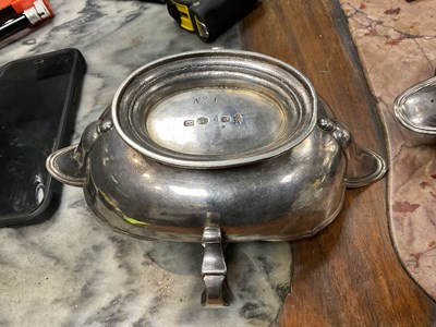 Lot 329 - AN IMPORTANT AND RARE PAIR OF GEORGE I CAST SILVER DOUBLE LIPPED SAUCE BOATS BY PIERRE PLATEL DATED 1717
