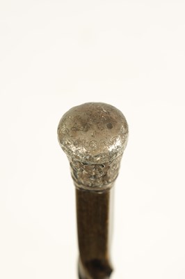 Lot 371 - A 19TH CENTURY BLACK RHINOCEROS HORN WALKING STICK