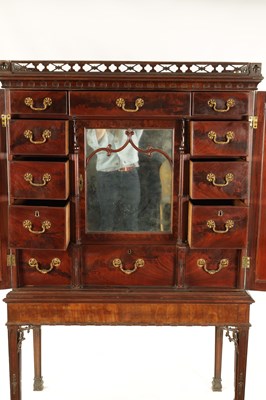 Lot 971 - A FINE MID 18TH CENTURY MAHOGANY SECRETAIRE CABINET ON STAND IN THE MANNER OF THOMAS CHIPPENDALE