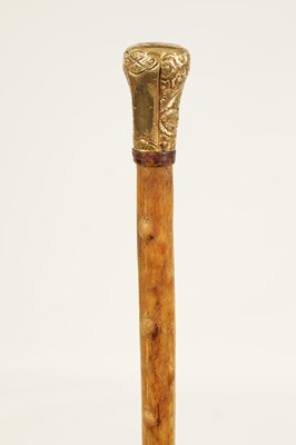 Lot 372 - A 19TH CENTURY RHINOCEROS HORN WALKING STICK