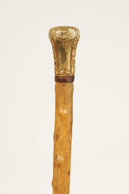 Lot 372 - A 19TH CENTURY RHINOCEROS HORN WALKING STICK