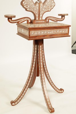 Lot 155 - AN EARLY 20TH CENTURY ANGLO INDIAN HARDWOOD AND BONE MARQUETRY INLAID ADJUSTABLE DRESSING MIRROR ON STAND