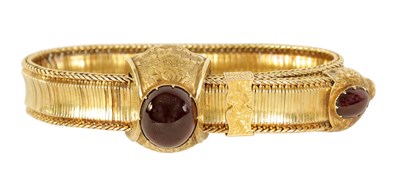 Lot 234 - A 19TH CENTURY 14CT GOLD AND GARNET BRACELET