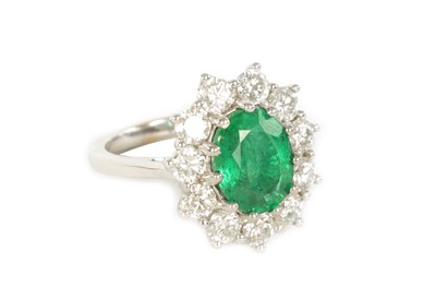 Lot 253 - A LARGE 18CT WHITE GOLD EMERALD AND DIAMOND RING