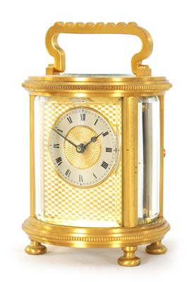 Lot 686 - A LATE 19TH CENTURY GILT BRASS FRENCH MINIATURE CYLINDRICAL CARRIAGE CLOCK