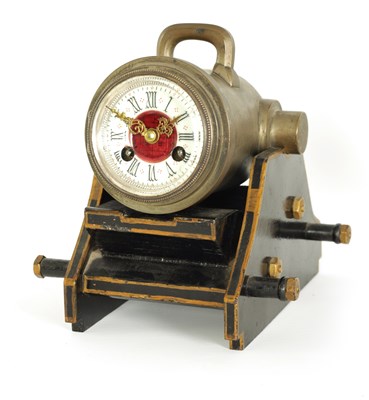 Lot 797 - A LATE 19TH CENTURY FRENCH INDUSTRIAL SILVERED BRASS DESK CLOCK FORMED AS A CANNON