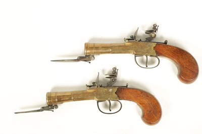 Lot 679 - A RARE PAIR OF EARLY 19TH CENTURY FLINTLOCK BOX-LOCK BLUNDERBUSS-PISTOLS WITH UNDER SPRING BAYONETS BY YOUNG