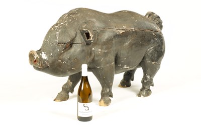 Lot 592 - AN EARLY 19TH CENTURY CARVED WOOD BUTCHERS SHOP ADVERTISING DISPLAY DEPICTING A POT-BELLIED PIG.