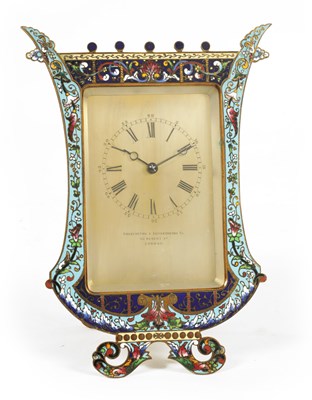 Lot 721 - A LATE 19TH CENTURY FRENCH CHAMPLEVE ENAMEL STRUT CLOCK