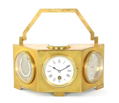 Lot 1236 - A LATE 19TH CENTURY BRASS CASED DESK CLOCK COMPENDIUM