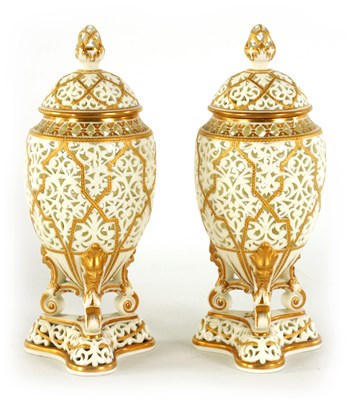 Lot 51 - A PAIR OF WORCESTER TYPE OVOID POT-POURRI VASES AND COVERS ON TRIFORM BASES - POSSIBLY GRAINGERS