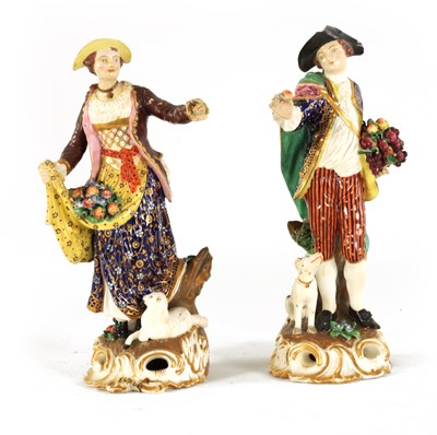 Lot 25 - A PAIR OF 18TH CENTURY DERBY PORCELAIN FLOWER SELLER FIGURES