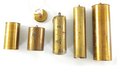 Lot 1058 - A SELECTION OF FIVE 19TH CENTURY BRASS CASED CLOCK WEIGHTS